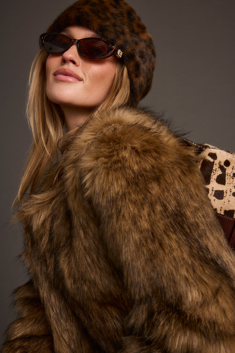 Detail shot of the Chalet Leopard Faux Fur Headband highlighting the faux fur elements.