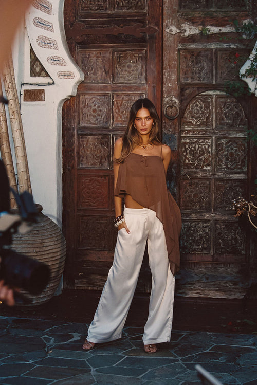 Mocha top with refined detailing and a flattering silhouette.