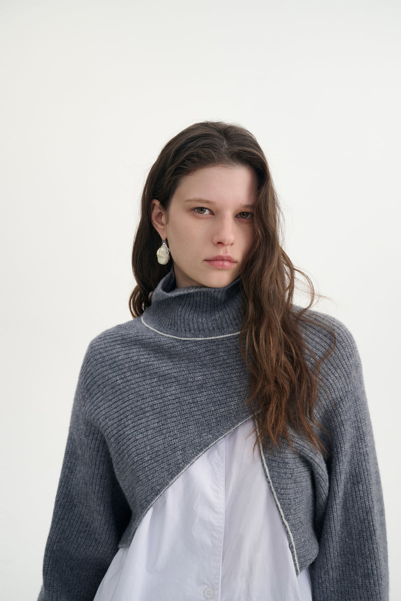Cropped asymmetrical sweater