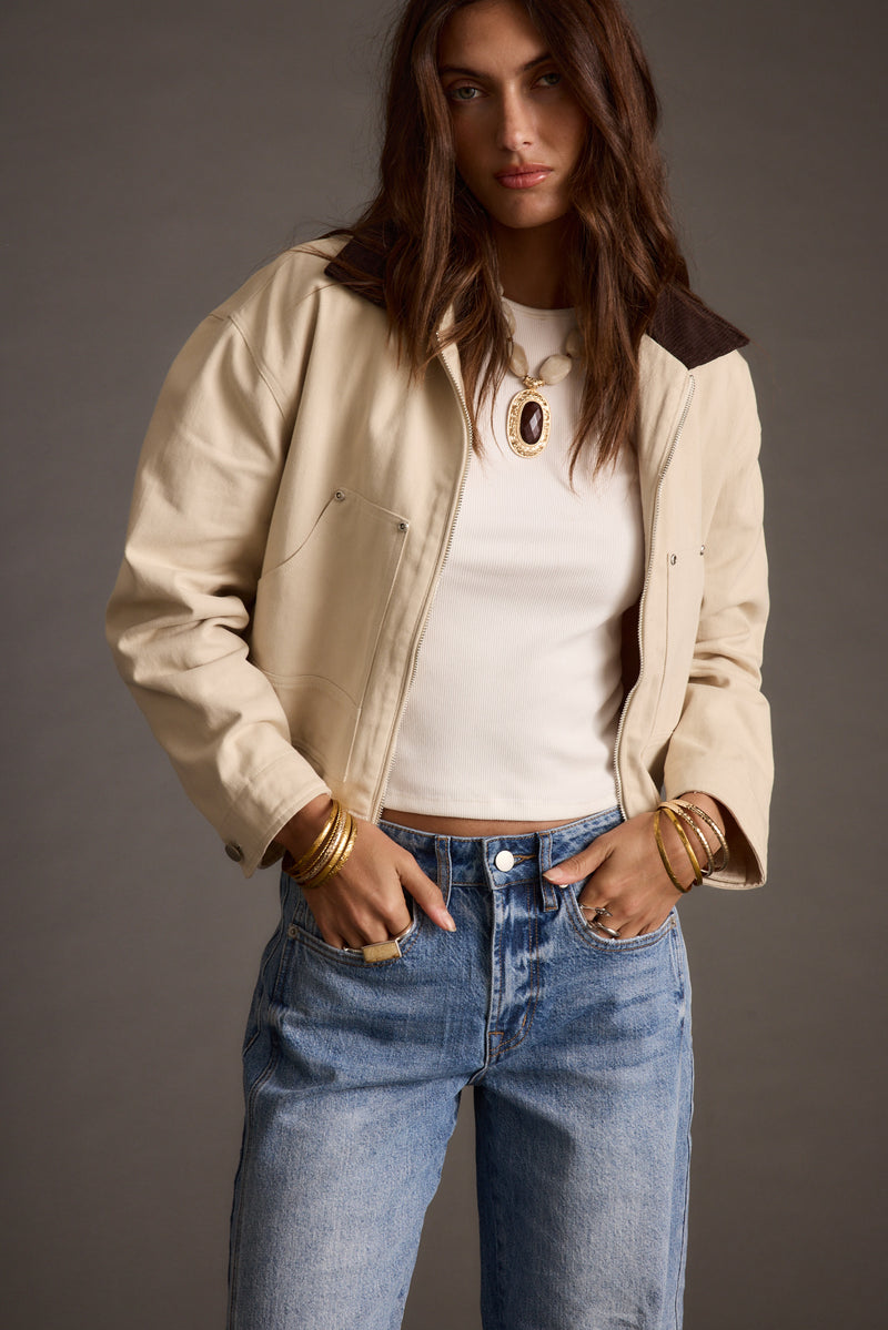 Close-up of the Cypress Light Khaki Cropped Barn Jacket showcasing the fabric texture and design details.
