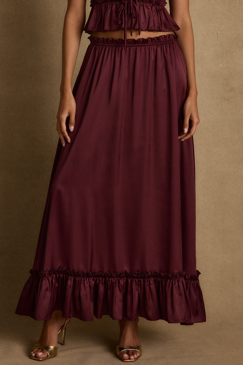 Back view of the satin maxi skirt showing the silhouette and fit.