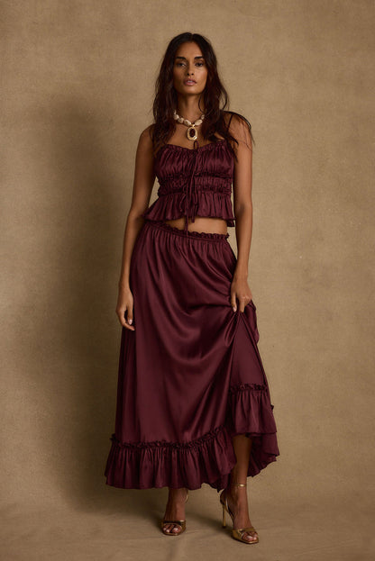 Close-up of the Dahlia Mulberry Satin Tank showcasing the satin texture and craftsmanship.