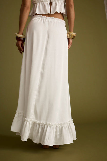 Dahlia White Satin Maxi Skirt paired with complementary accessories for a polished look.