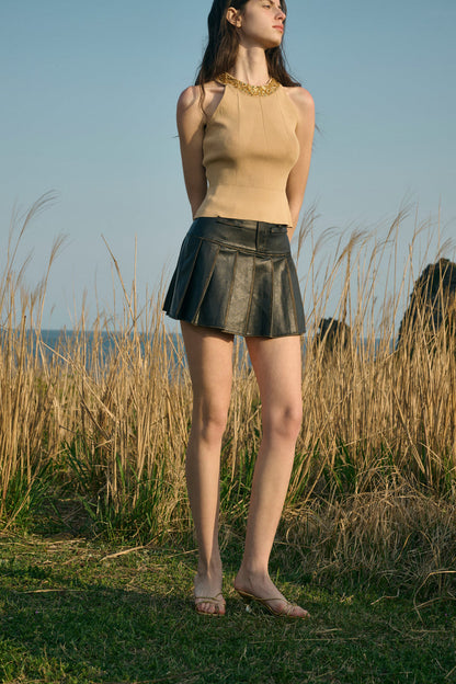 Distressed pleated mini skirt