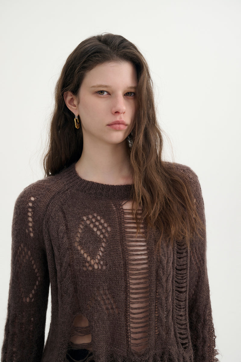 Distressed relaxed sweater