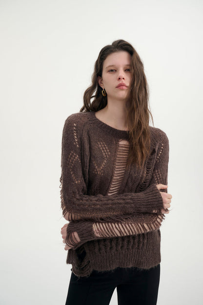 Distressed relaxed sweater