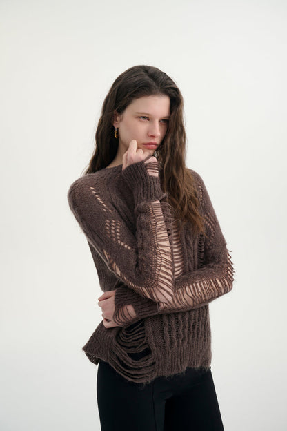 Distressed relaxed sweater