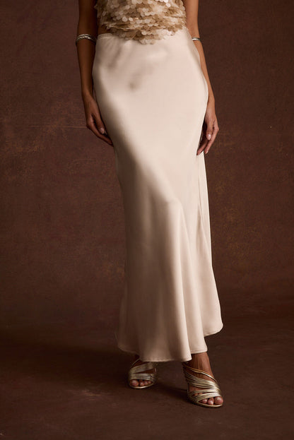 Champagne satin maxi skirt with refined accents, a lace maxi skirt essential.