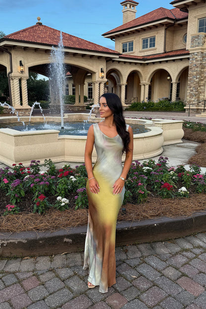 Lifestyle shot of the maxi dress styled for day-to-night versatility.