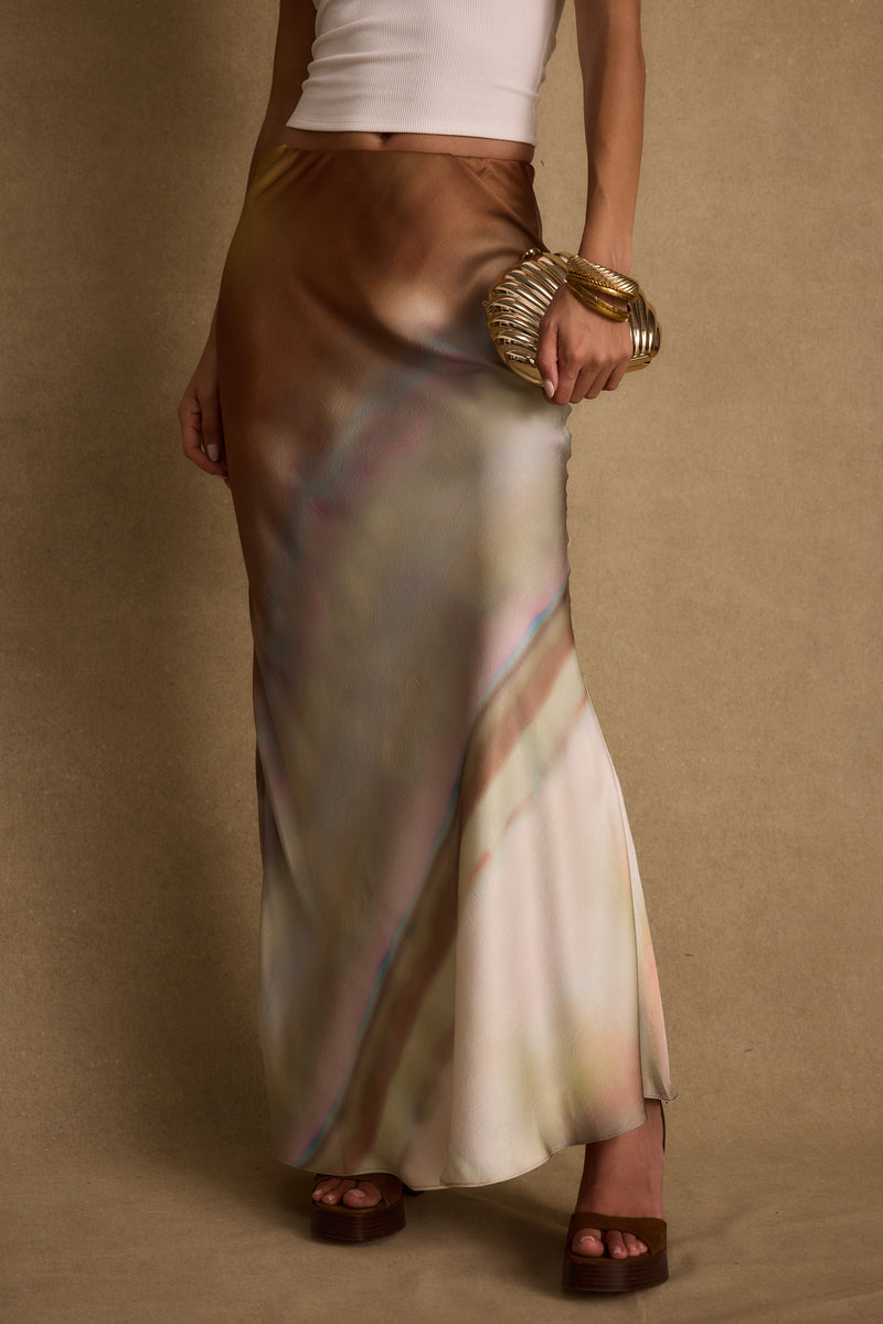Back view of the satin maxi skirt showing the silhouette and fit.