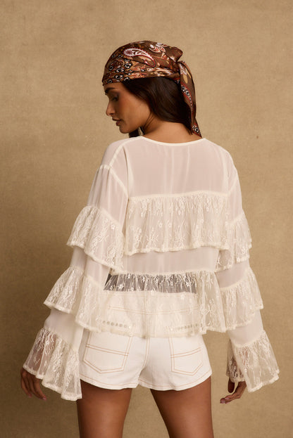 Elowen Ivory Tiered Blouse styled in a complete look from an alternate angle.
