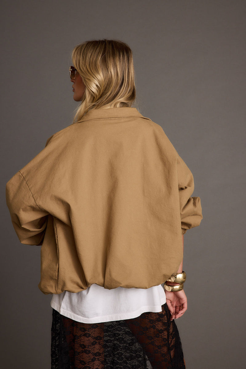 Back view of the jacket showing the silhouette and fit.