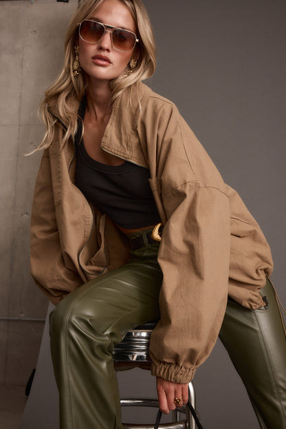 Lifestyle shot of the jacket styled for day-to-night versatility.