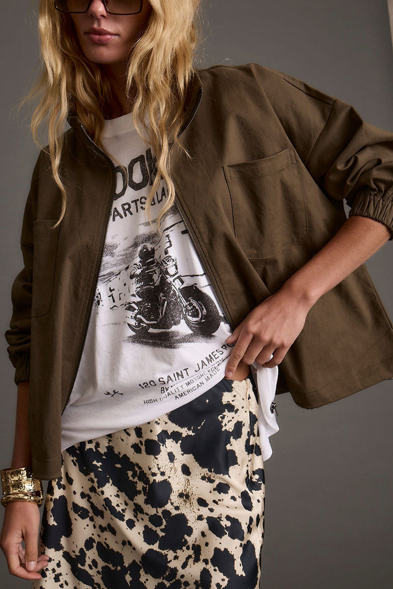 Olive jacket with refined detailing and a flattering silhouette.