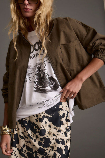 Olive jacket with refined detailing and a flattering silhouette.