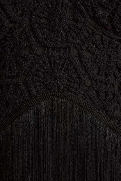 Additional view of the Finnley Black Crochet Fringe Mini Dress from a different perspective.