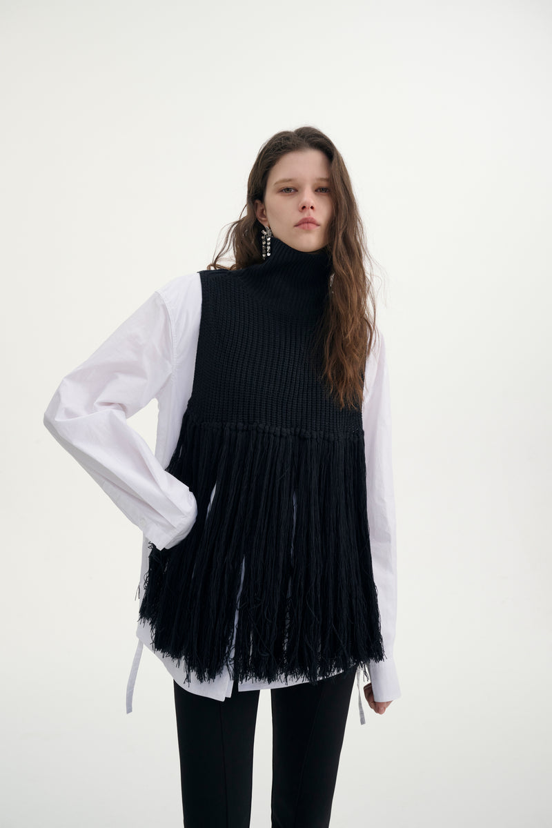 Fringed turtleneck vest