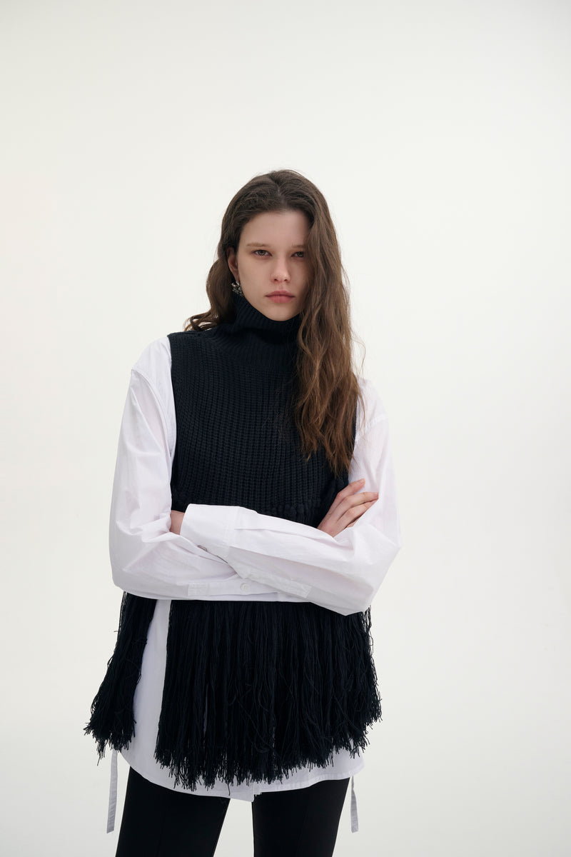 Fringed turtleneck vest
