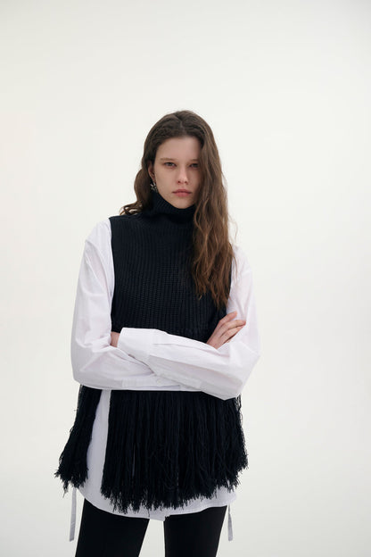 Fringed turtleneck vest