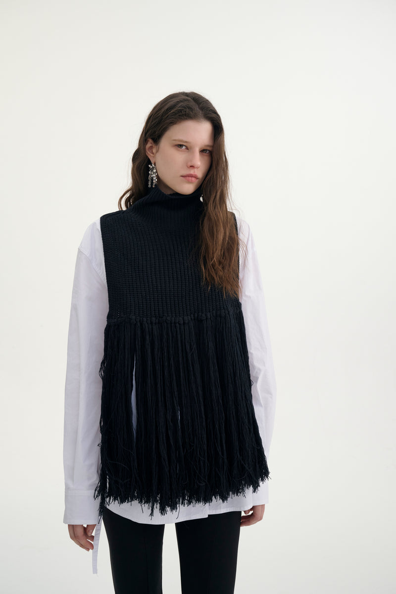 Fringed turtleneck vest