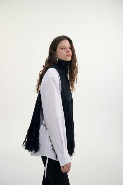 Fringed turtleneck vest