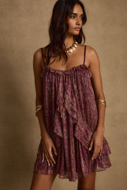 Back view of the mini dress showing the silhouette and fit.