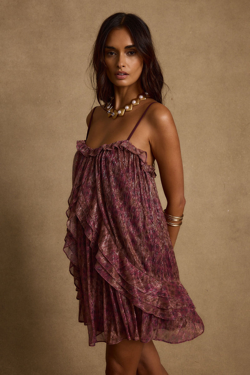 Detail shot of the Golden Hour Raspberry Ruffle Mini Dress highlighting the ruffled elements.