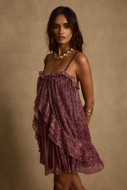 Detail shot of the Golden Hour Raspberry Ruffle Mini Dress highlighting the ruffled elements.
