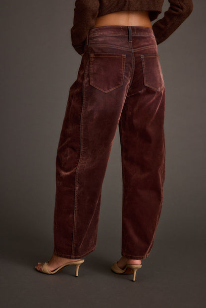 Close-up of the Gracyn Mulberry Velveteen Barrel Pants showcasing the fabric texture and design details.