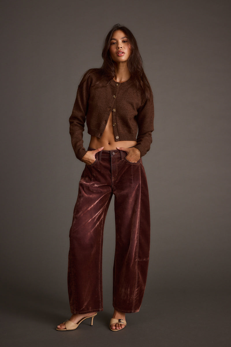 Lifestyle shot of the pants styled for day-to-night versatility.
