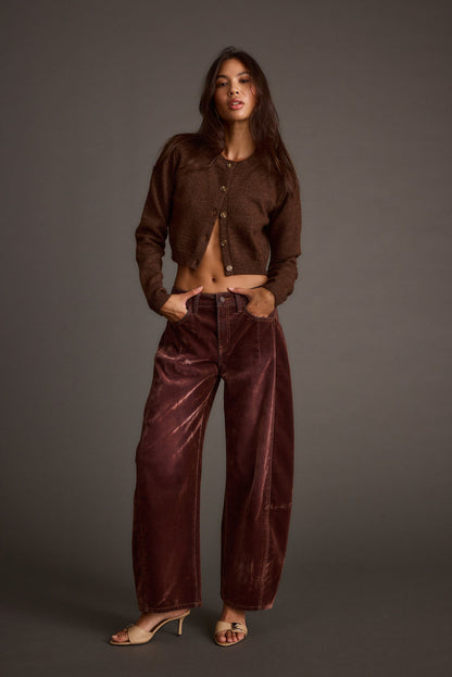 Lifestyle shot of the pants styled for day-to-night versatility.