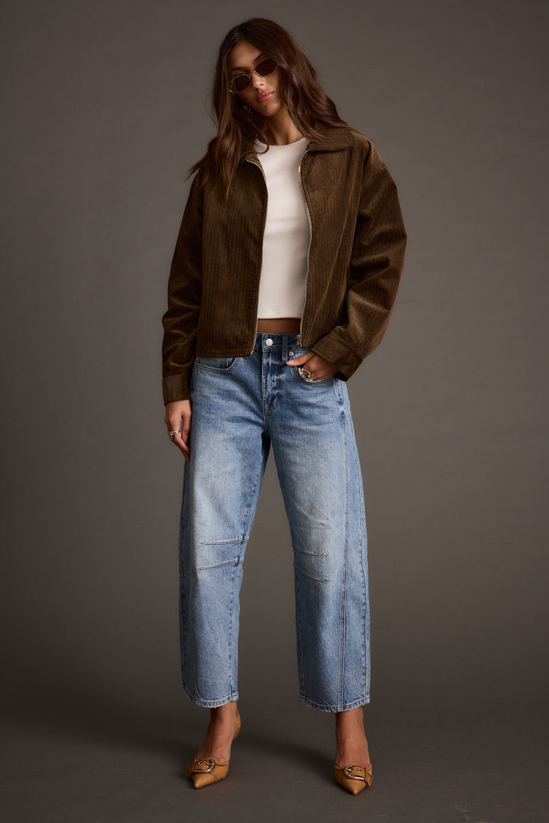 Back view of the mocha corduroy jacket showing the silhouette and fit.