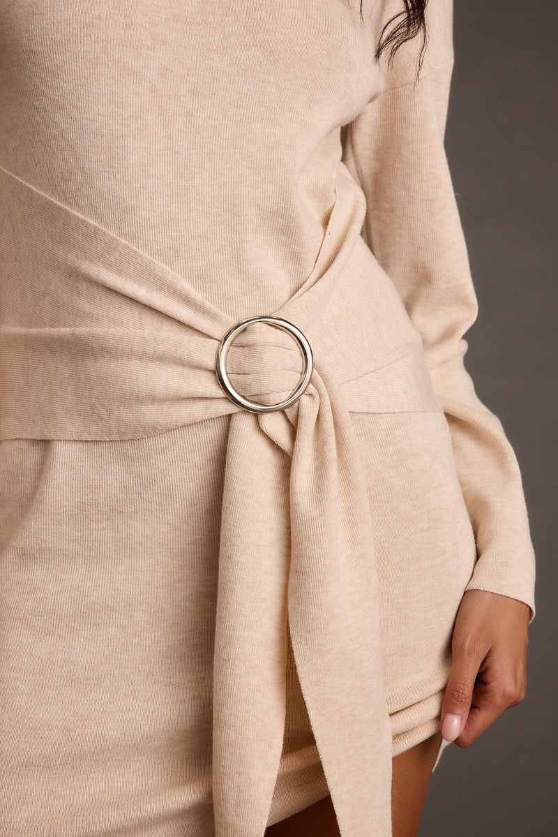 Close-up of the Grayden Cream Belted Mini Dress showcasing the fabric texture and design details.