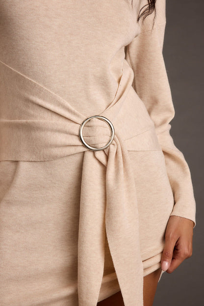 Close-up of the Grayden Cream Belted Mini Dress showcasing the fabric texture and design details.