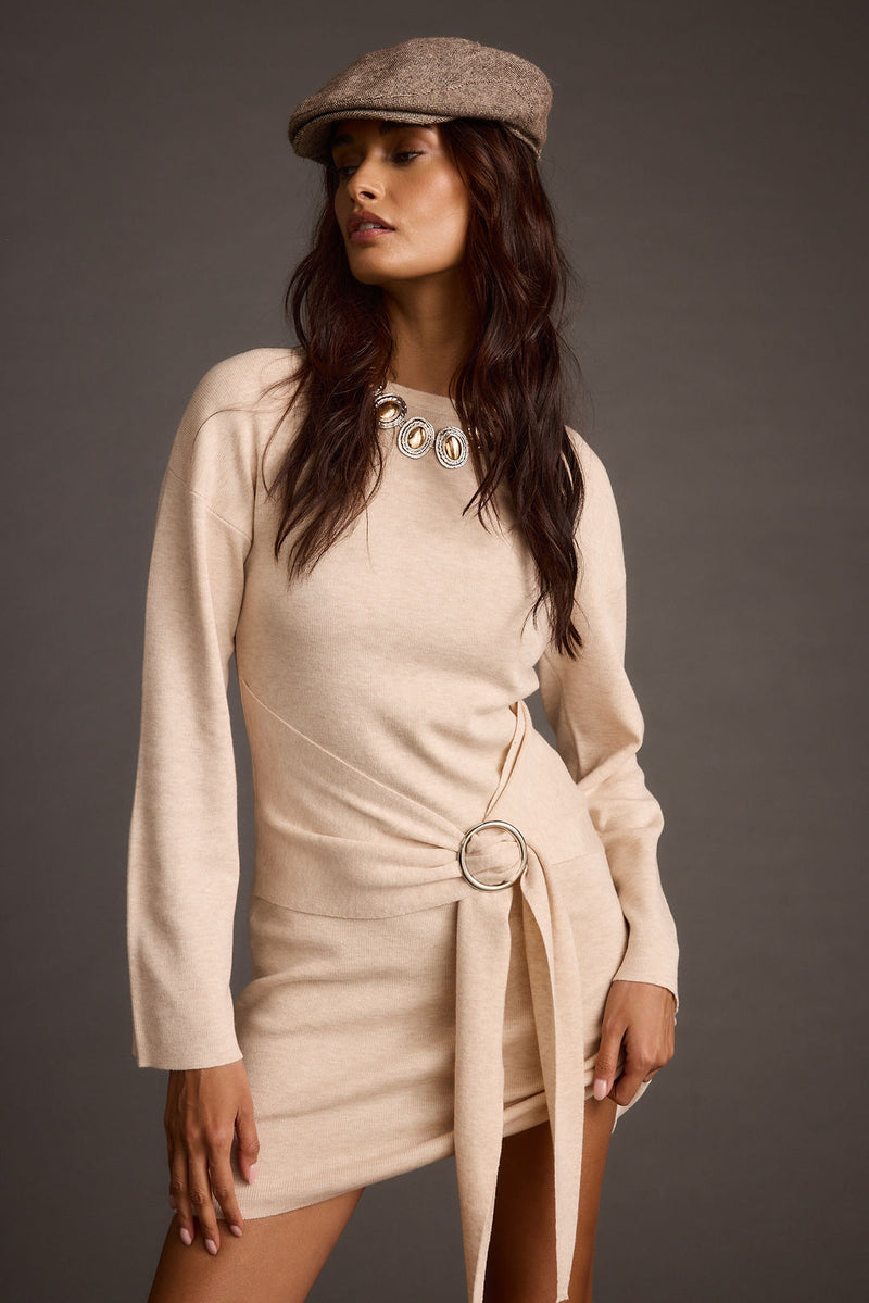 Grayden Cream Belted Mini Dress styled in a complete look from an alternate angle.