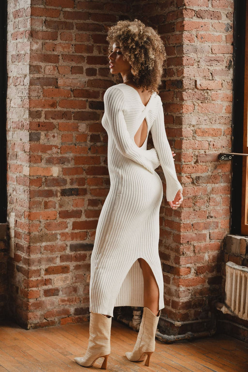 Additional view of the Gwyneth White Sweater Midi Dress from a different perspective.