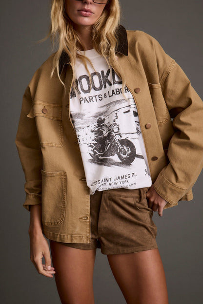 Khaki barn jacket with elegant accents, a cropped barn jacket essential.