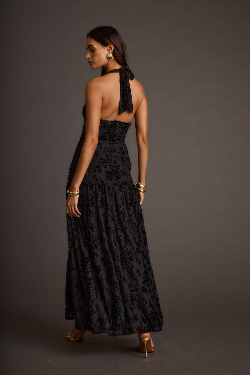 Close-up of the Hollow Black Burnout Halter Maxi Dress showcasing the fabric texture and design details.