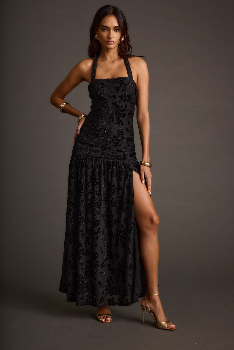Detail shot of the Hollow Black Burnout Halter Maxi Dress highlighting the halter elements.