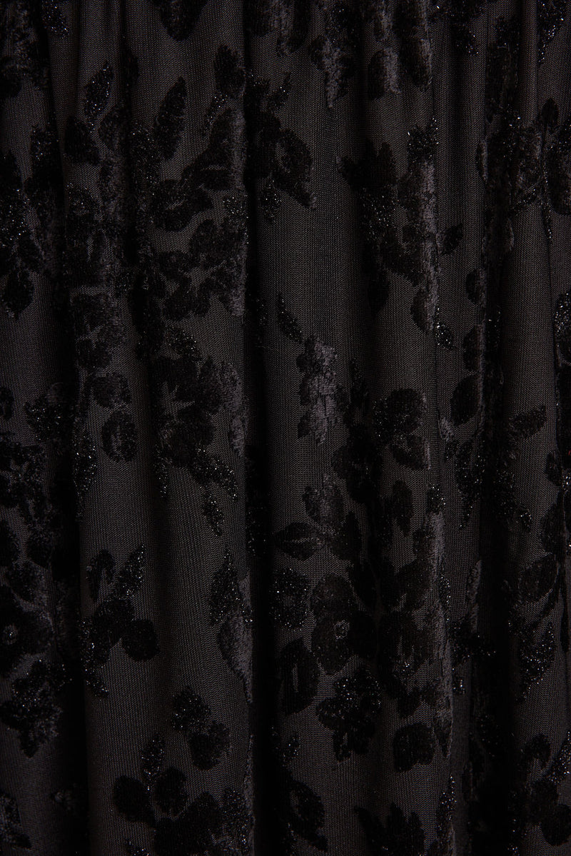 Additional view of the Hollow Black Burnout Halter Maxi Dress from a different perspective.