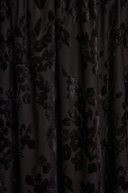 Additional view of the Hollow Black Burnout Halter Maxi Dress from a different perspective.
