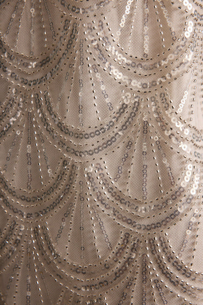 Izzie White Beaded Mini Dress paired with complementary accessories for a polished look.