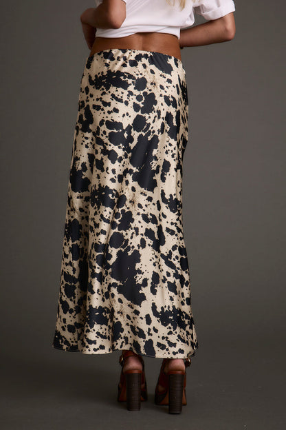Close-up of the Kacey Cowhide Maxi Skirt showcasing the fabric texture and design details.