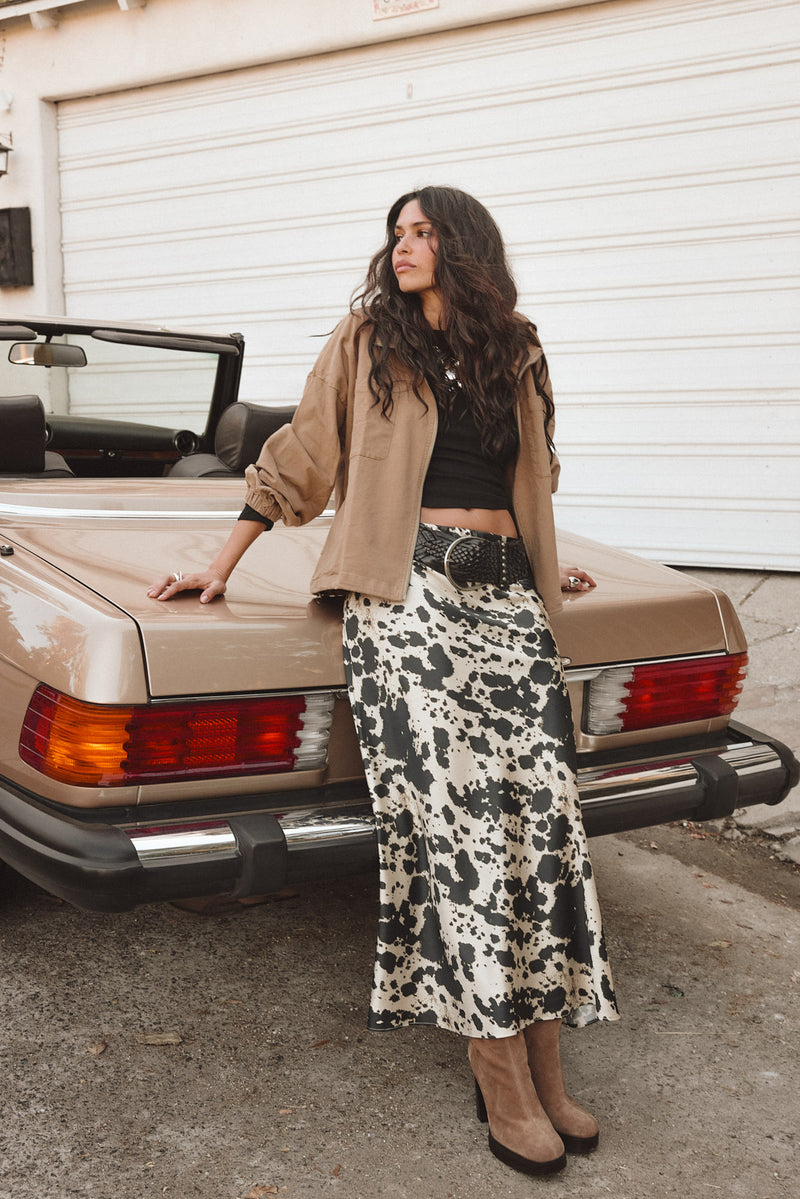 Maxi skirt with elegant accents, a cowhide skirt essential.