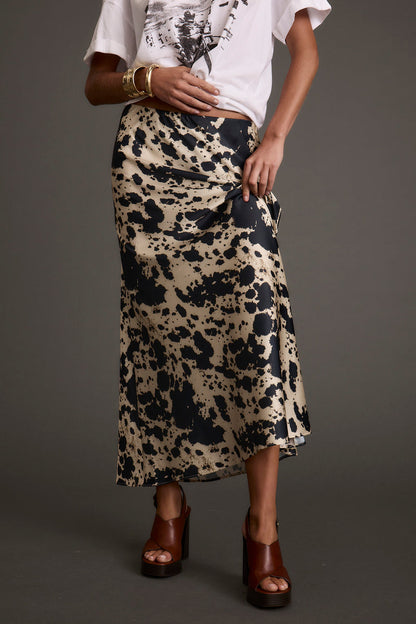 Kacey Cowhide Maxi Skirt shown in a complementary styling arrangement.