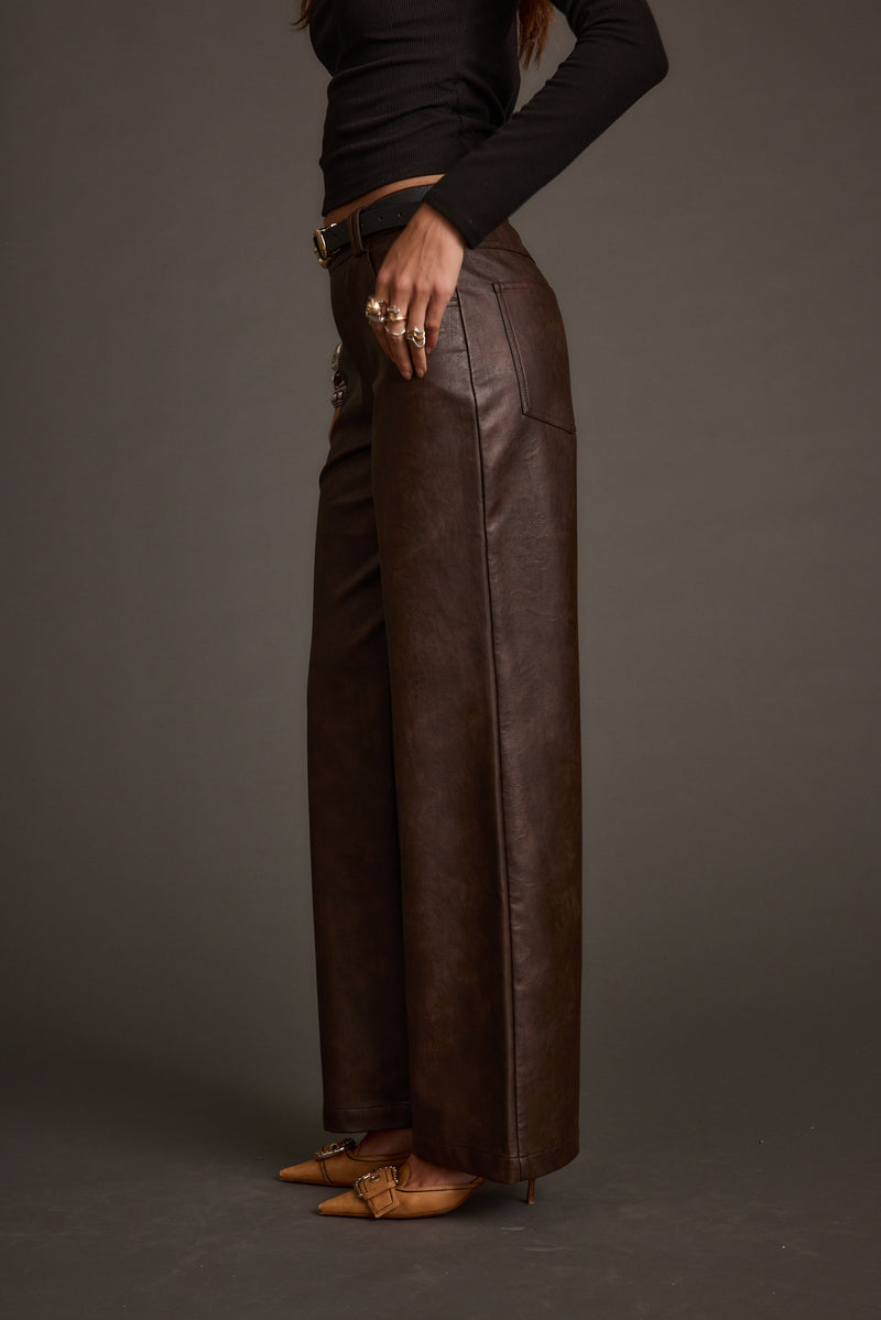 Full-length view of the espresso pants showing the drape and movement.