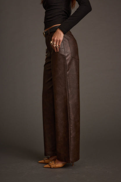 Full-length view of the espresso pants showing the drape and movement.