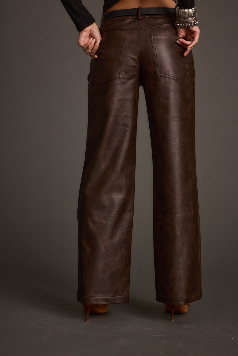 Detail shot of the Kennedy Espresso Vegan Leather Pants highlighting the vegan leather and leather elements.