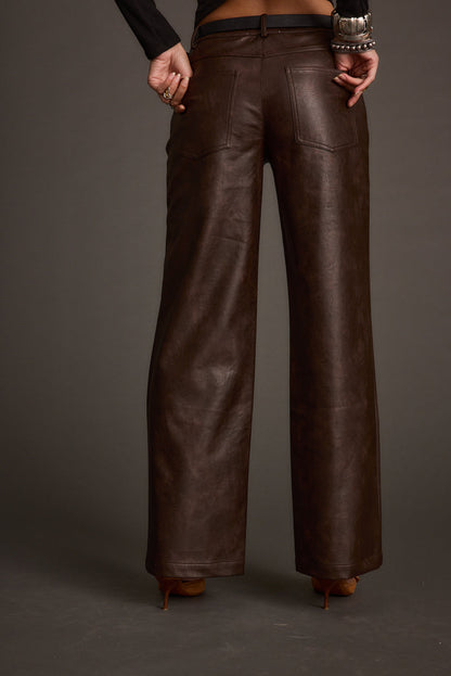 Detail shot of the Kennedy Espresso Vegan Leather Pants highlighting the vegan leather and leather elements.