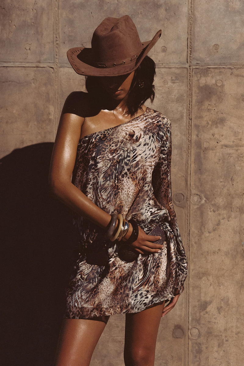 Close-up of the Kiki Animal Mini Dress showcasing the fabric texture and design details.